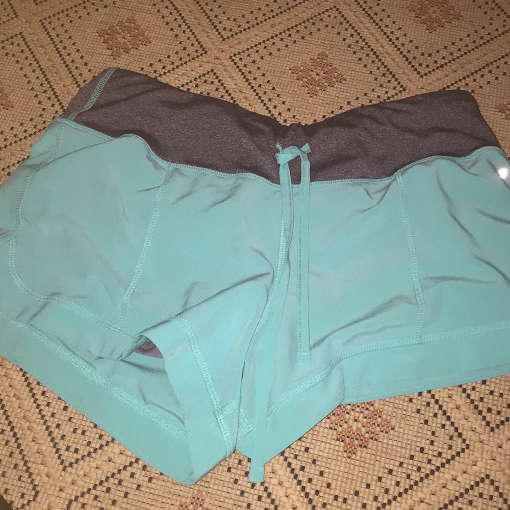 Teal & black swimming shorts